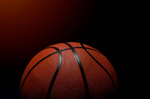 Basketball ball on black background with copy space
